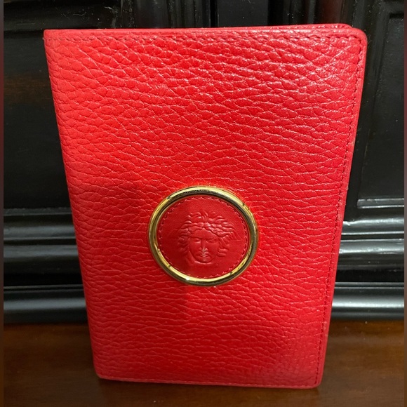 Versace Handbags - Reserved for Robbie Versace Red pebbled  Leather wallet with Embossed Logo